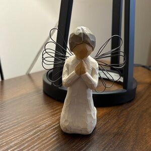 Elegant Cream Angel Figurine with Black Wire Wings